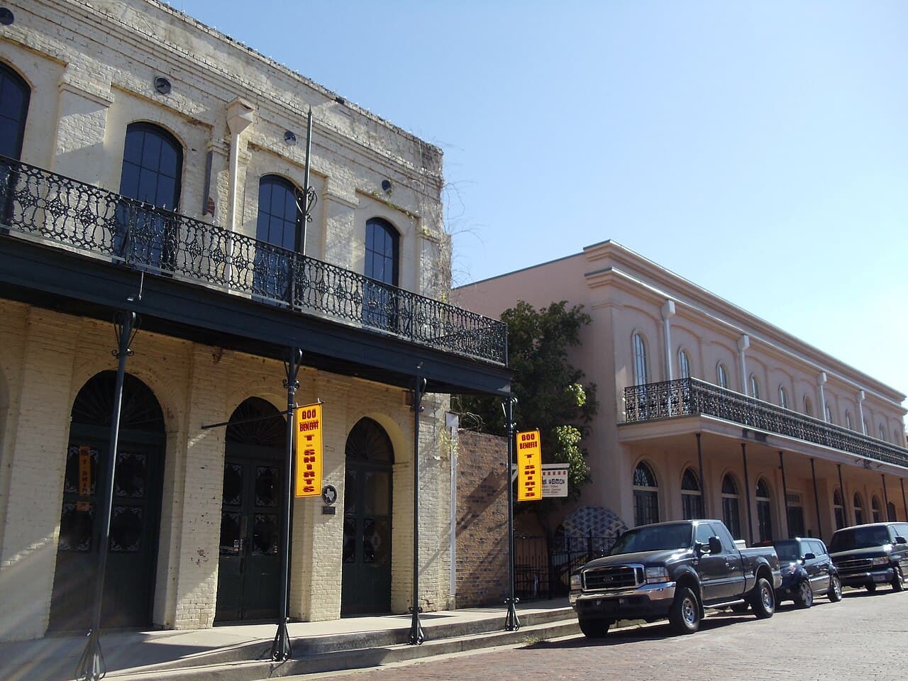 Historic brick buildings with wrought-iron balconies in Jefferson, Texas